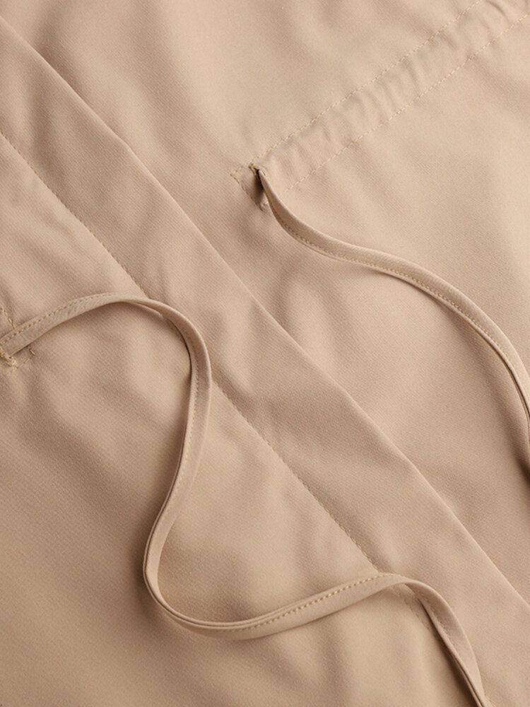 Frauen Lose Gefalteter Vorderer Reißverschluss Drawstring-elastische Taillen-schmetterlings-knoten-mäntel