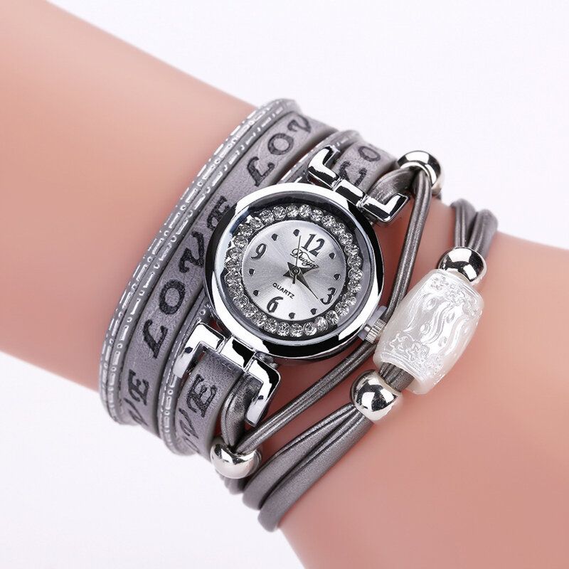 Arbeiten Sie Luxuxrhinestone-pu-leder-frauen-quarz-uhr-armband-uhr Um