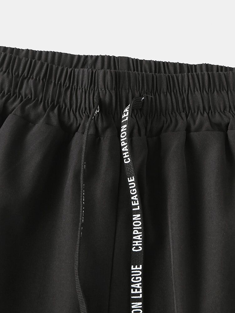 Sportbekleidung Für Herren Einfarbig Schnell Trocknend Kordelzug Reißverschlusstaschen Strand-boardshorts