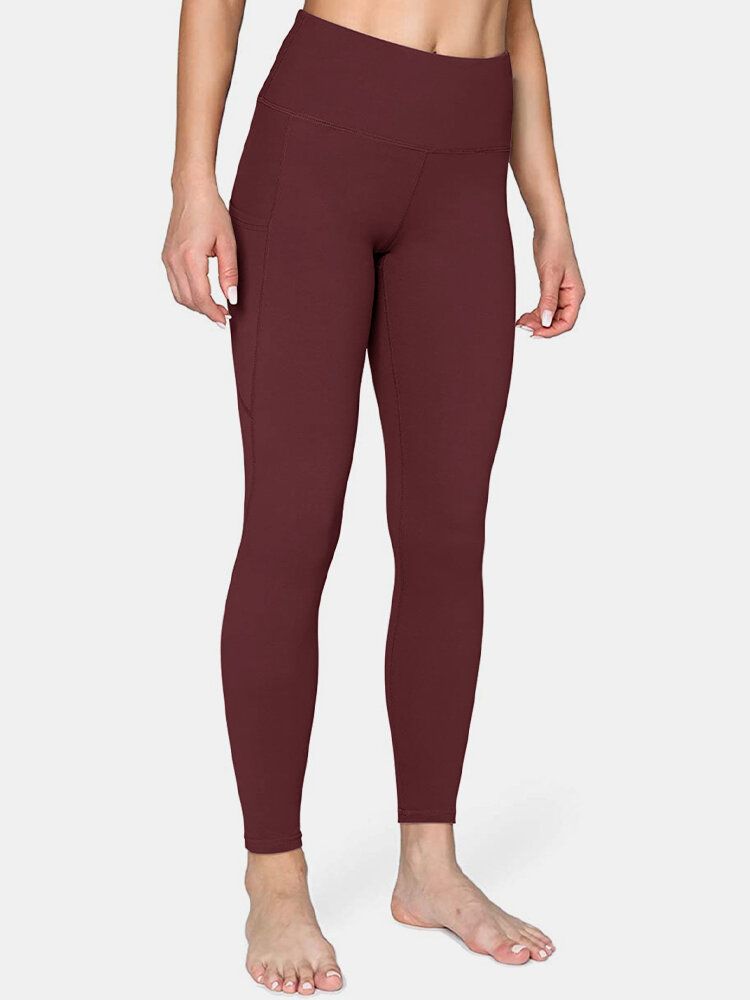 Damen Einfarbig Seitentasche Hip Lift Sport Yoga Legging