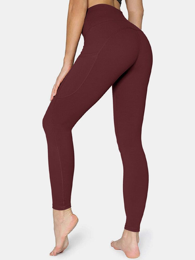 Damen Einfarbig Seitentasche Hip Lift Sport Yoga Legging