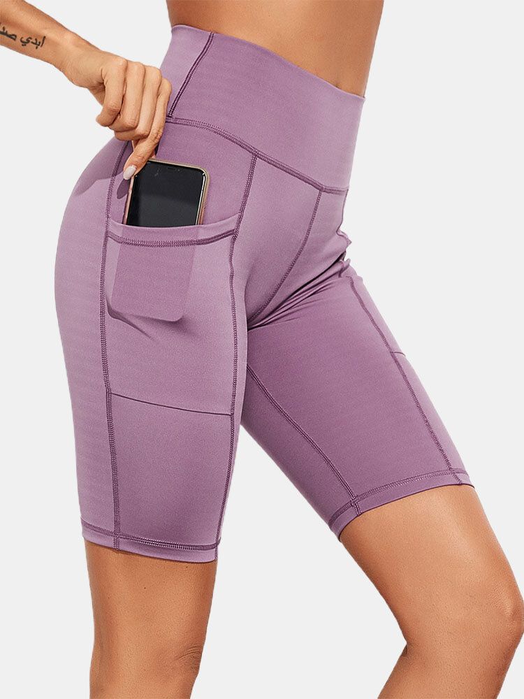 Einfarbige Yoga-leggings Mit Schmaler Hüfte Und Taschen