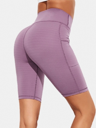 Einfarbige Yoga-leggings Mit Schmaler Hüfte Und Taschen