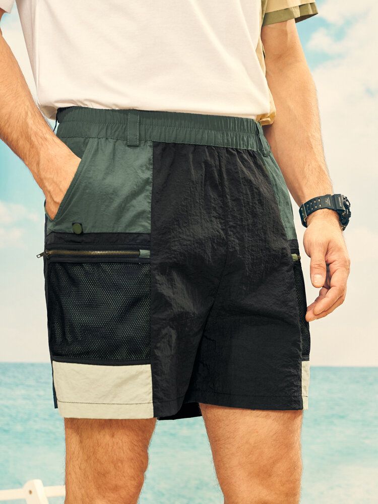 Herren-shorts Mit Elastischem Bund Und Reißverschlusstaschen In Colorblock-optik