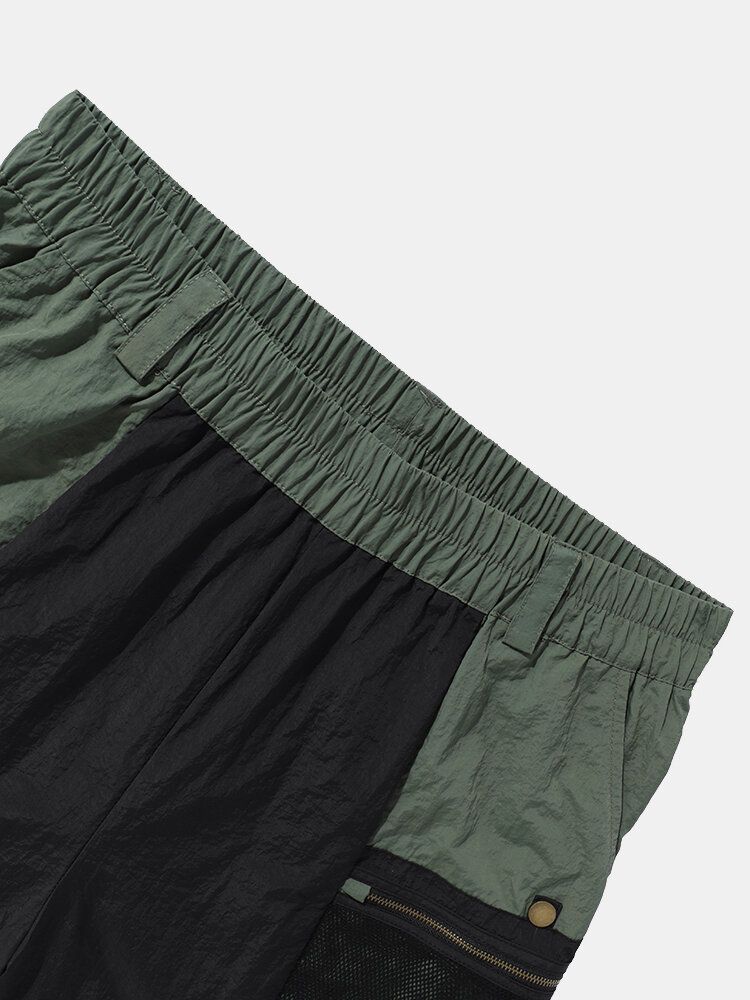 Herren-shorts Mit Elastischem Bund Und Reißverschlusstaschen In Colorblock-optik