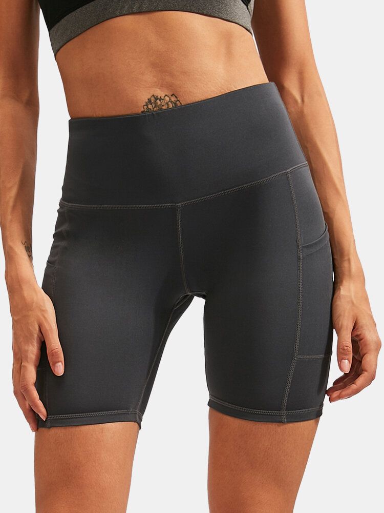 Frauen Einfarbig Schnell Trocknend Yoga Sport Hohe Elastische Shorts Mit Seitentasche