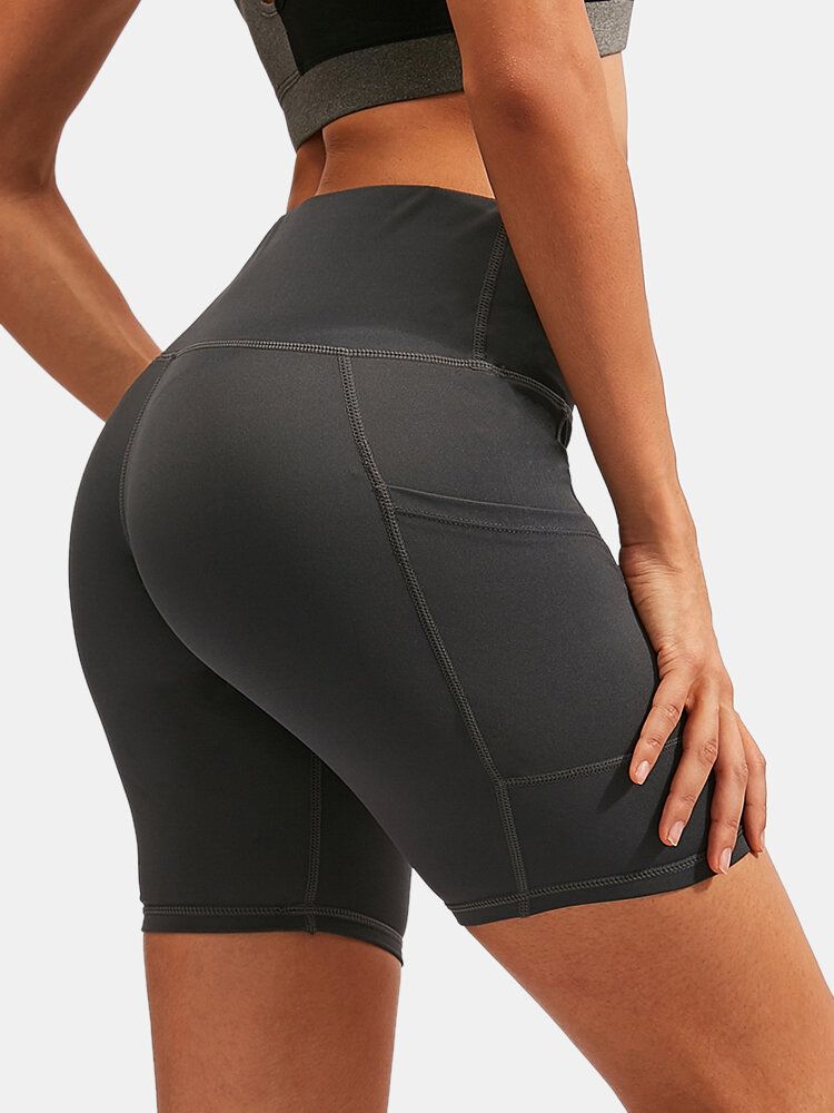 Frauen Einfarbig Schnell Trocknend Yoga Sport Hohe Elastische Shorts Mit Seitentasche