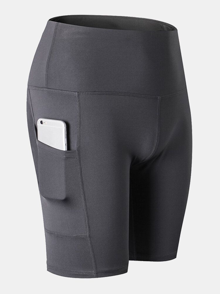 Frauen Einfarbig Schnell Trocknend Yoga Sport Hohe Elastische Shorts Mit Seitentasche