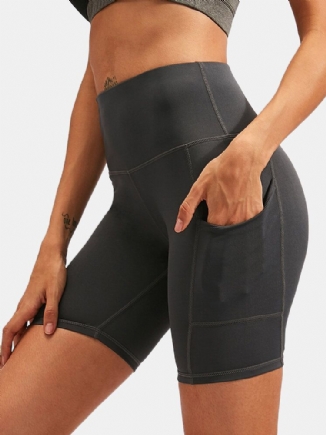 Frauen Einfarbig Schnell Trocknend Yoga Sport Hohe Elastische Shorts Mit Seitentasche